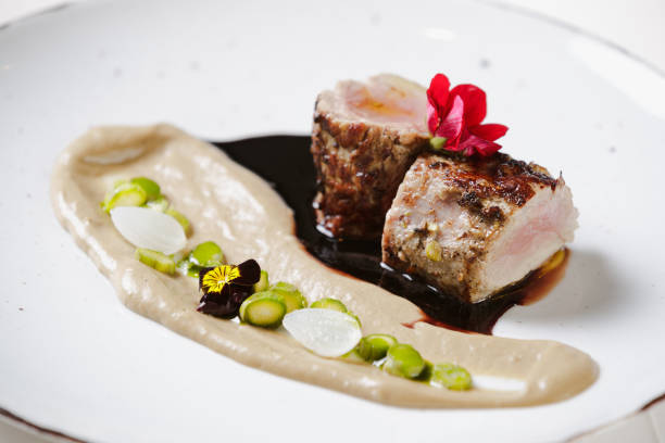 istock Medium rare beef served with fava bean puree and soy sauce 1407475434