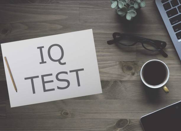 istock IQ test-intelligence is a quantitative assessment of the level of mental development, solution to logical and arithmetic tasks. Intelligence testing concept 1407476577
