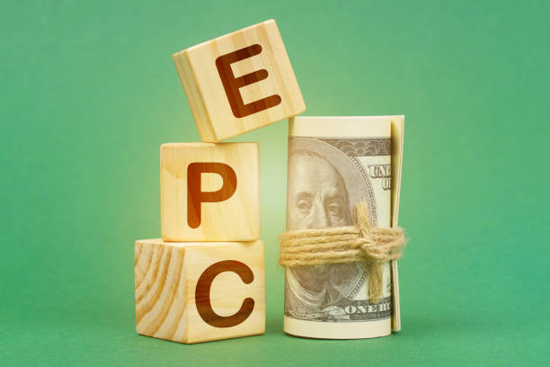istock On a green surface, dollars and cubes with the inscription - EPC 1407476618