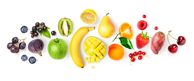 Fruit and berry mix banner. Grape, blueberry, fig, kiwi, apple, lemon, mango, banana, apricot, tangerine, strawberry, pear, strawberry and cherry isolated on white background. Flat lay, top view