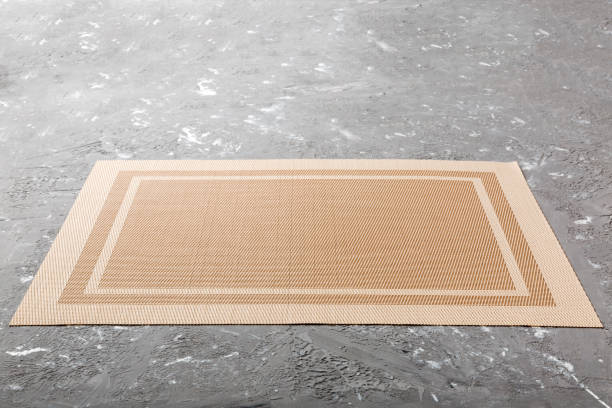 istock Perspective view of brown tablecloth for food on cement background. Empty space for your design 1407496657