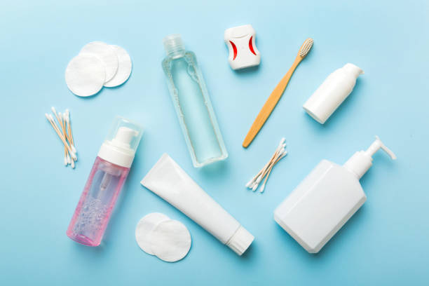 istock Mockup for bathing products top view flat lay, spa razor, toothpaste, soap, gel and other various accessories. Cosmetics for skin health. Bath Mockup for your logo 1407496786
