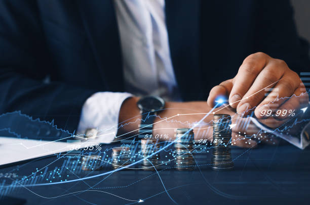 rapport sur les devises de la technologie des actions sur l’investissement financier et le succès. piles de pièces avec graphique de trading. graphique graphique financier des entreprises sur l’économie. - tax graph financial report finance photos et images de collection