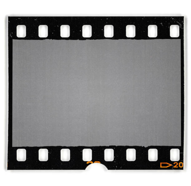 istock single 35mm film snip with black border and empty frame. 1407502125