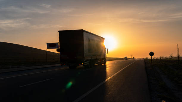 istock Vehicles exporting at sunrise view 1407502395