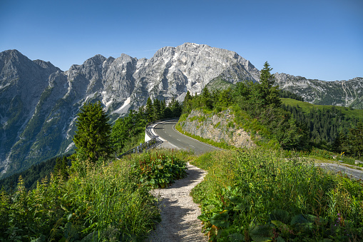 Scenic mountain road Rossfeld Panoramastrasse, in the background the summit of the Hoher Göll, Berchtesgaden, Bavaria, Germany, Europe