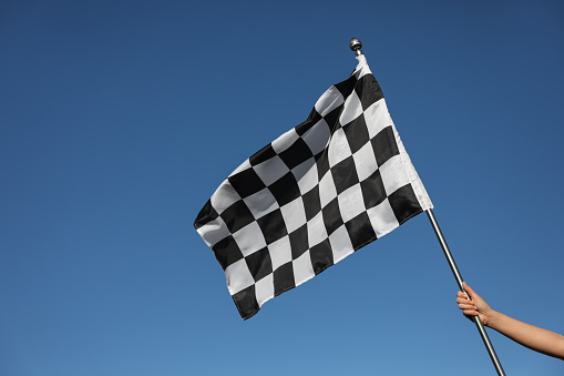 3D rendering of wavy checkered flag, closeup background