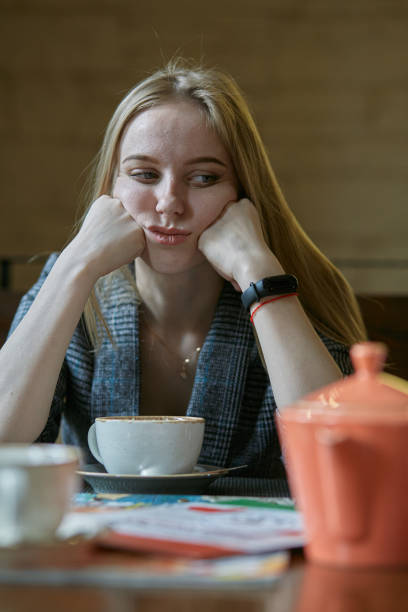istock sad blond woman 1407503134