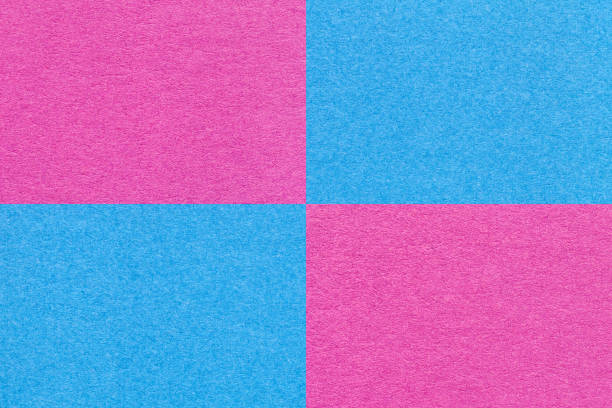 istock Texture of craft bright blue and purple paper background with cells pattern. Structure of vintage lilac cardboard. 1407504328