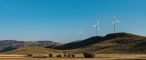 istock clean electricity producing wind turbine or windmill built on a windy mountain ridge 1407504720