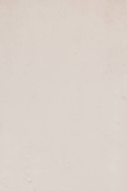 istock Part of a cream colored concrete wall 1407508799