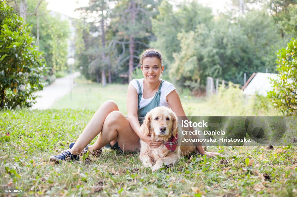 best friendship young woman having fun outdoor with her dog Happiness Stock Photo