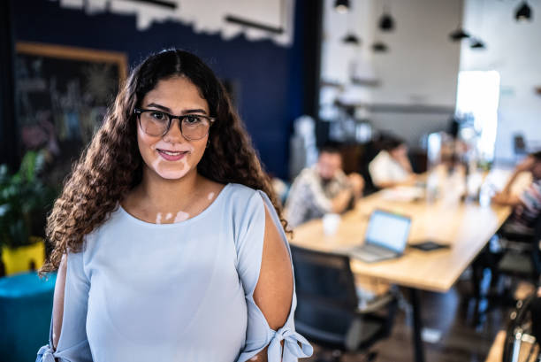 istock Portrait of young woman at work 1407510736