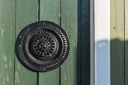 View of a door's peephole at the French Quarter house in New Orleans.