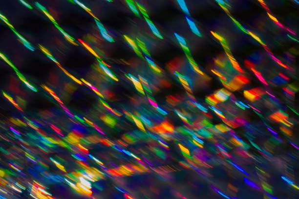 Holographic background with multiple colors. Colorful bokeh on defocused background. Holographic background with multiple colors. Colorful bokeh on defocused background. Neon lines. concentrated solar power photos stock pictures, royalty-free photos & images