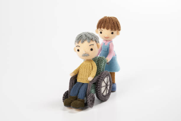 Grandfather with cute baby Boy on lap.