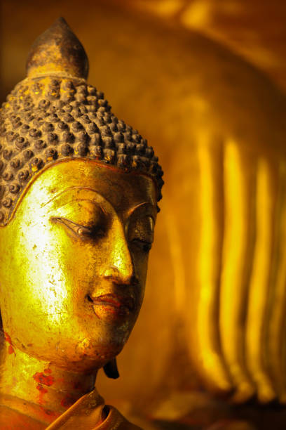 istock Buddha statue, Buddha images and deities close-up, sacred objects, gods, Thai arts, ancient Buddhist art, Buddha made by gold, bronze, silver, photo group and portraits of Buddha 1407517620