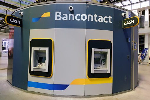 A label of Bancontact which is the market leader for electronic payments in Belgium outside of bank branch  in Ostend, Belgium on Jul. 3, 2022.
