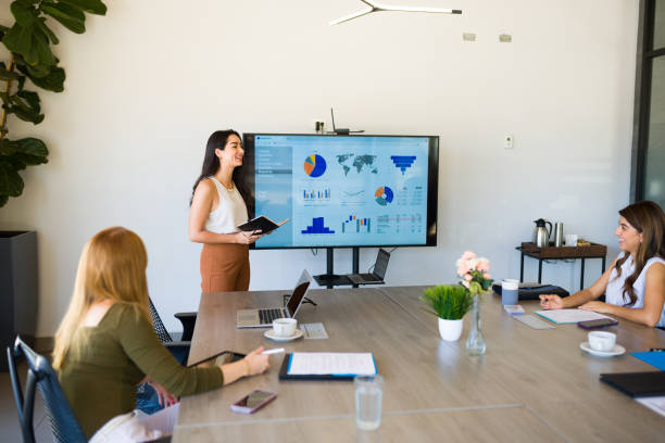 istock Female boss giving a work presentation during a meeting 1407521630
