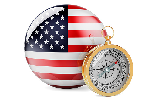 Compass with The United States flag. Travel and tourism in the USA concept. 3D rendering isolated on white background