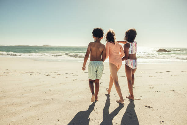istock Adorable friendship moments at the beach 1407528191