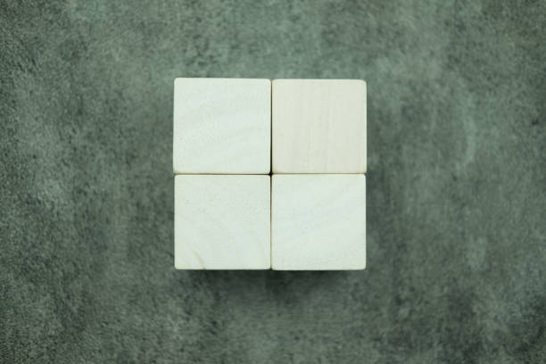istock Empty four wooden blocks stacked in two rows combined into a big square. 1407533866