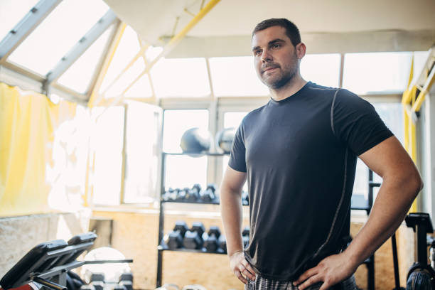 istock Fit man in gym 1407535866