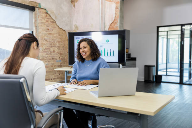 istock Small business owner meets with bank manager 1407536886