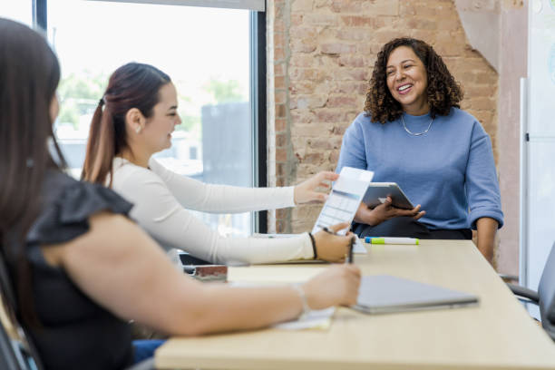 istock Female leadership team has a meeting 1407536892