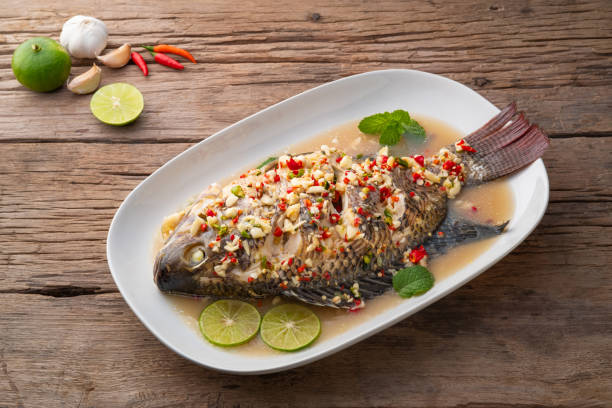 istock Steamed Tilapia Fish In Spicy Lime Soup 1407545389