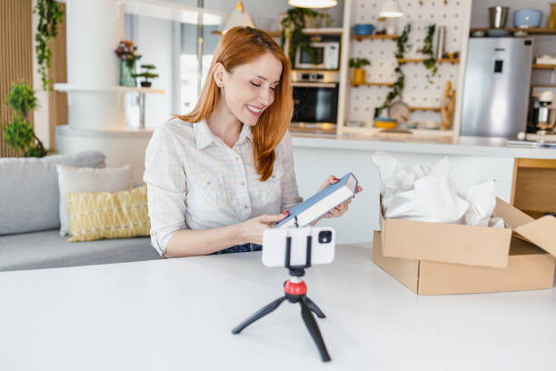 istock Young woman vlogging about her online purchase 1407547038