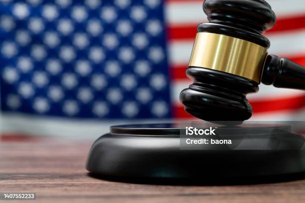 Wooden Gavel And American Flag Stock Photo - Download Image Now - Gavel, American Flag, Constitution