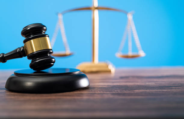 istock Gavel and scales of justice on the table 1407552367