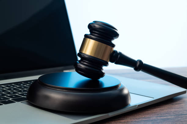 istock Gavel and laptop on the table 1407552427