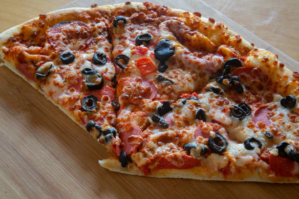 istock Piece of pizza 1407555688