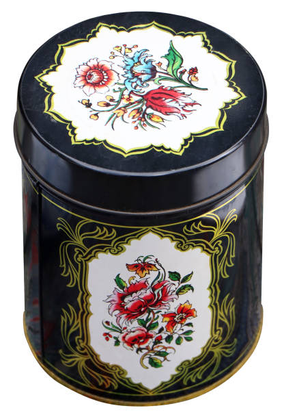 istock Old black Vintage round tin box, decorated with flowers 1407556931