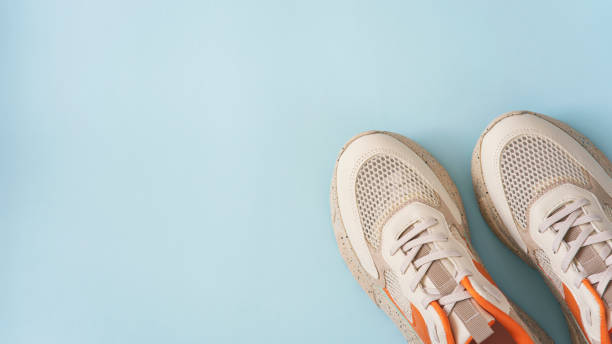 istock Colorful shoes on the blue backround 1407560170