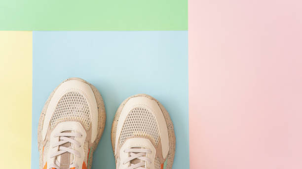 istock Colorful shoes on the blue backround 1407560316