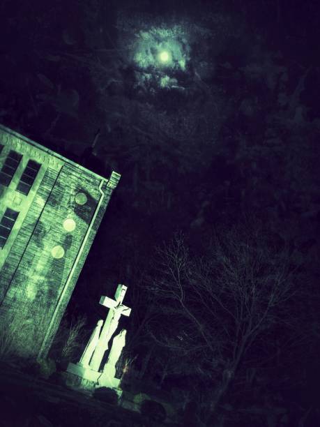 istock Moon at Night Over Church Crucifixion Statue 1407560538