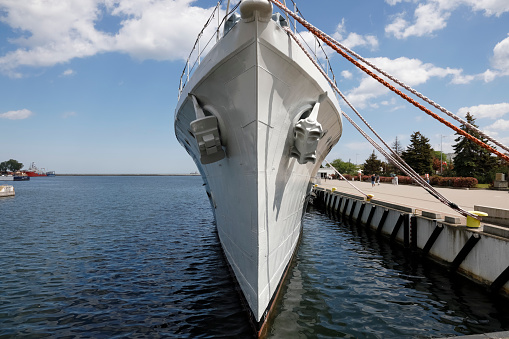 Gdynia, Poland - June 3, 2022: Bow with anchors of warship Blyskawica, Polish destroyer, in service in the Navy since 1937. This warship participated in WWII. It has been a museum ship since May 1976.