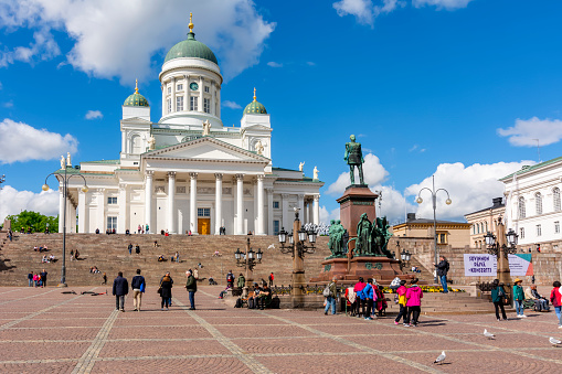 Helsinki, Finland - June 2019: Helsinki Cathedral and tzar Alexander II monument on Senate square