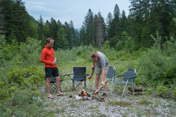 istock Friends enjoy a campfire in a forested glen 1407565163