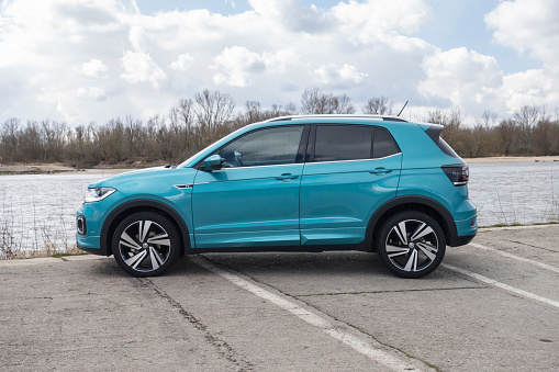 Berlin, Germany - 14th March, 2020: Volkswagen T-Cross stopped next to the river. The T-Cross is the smallest crossover/SUV in Volkswagen offer.