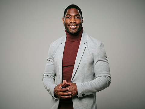 A studio portrait of an African American man.