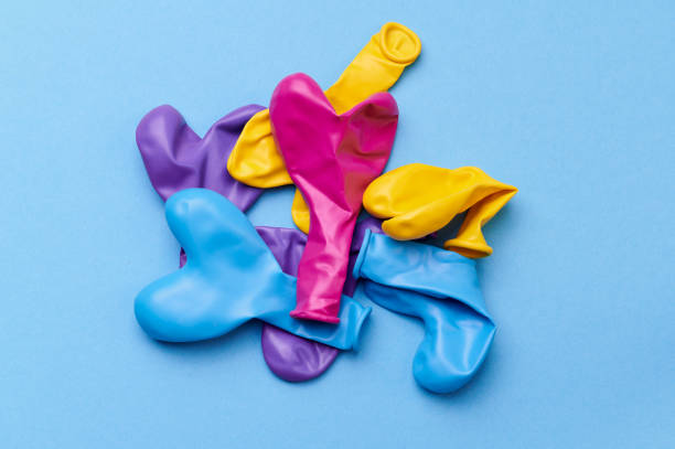 istock colored heart shaped balloons on blue background 1407567823