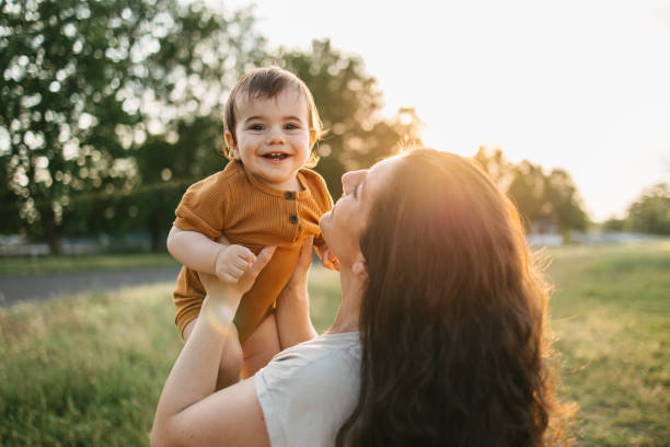 istock Mom holding her baby 1407571862