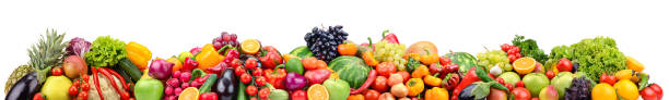 istock Bright berries, fruits and vegetables isolated on white 1407573418