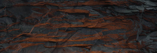 istock 3d rendering of cliff wall illuminated by the campfire 1407579502