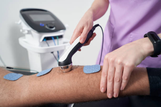 istock Man having ultrasound therapy procedure in physical therapy clinic 1407581415