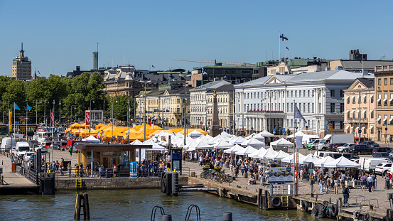 Helsinki, Finland - Jun 25th 2022: Tourists are back in Finland after Covid pandemic. Streets of Helsinki are full of people.